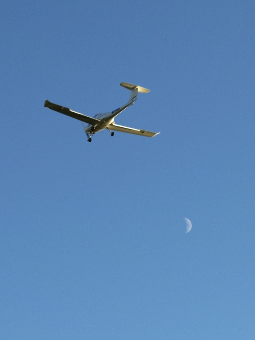 Plane and moon